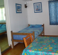 Cosy Cottages Amity Point - Palm Beach Accommodation