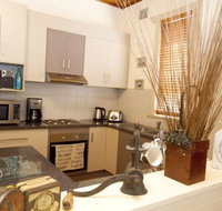 Anderl's Beach Cottage - Palm Beach Accommodation