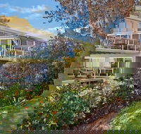 Arty Beach House at Lighthouse Beach - Palm Beach Accommodation