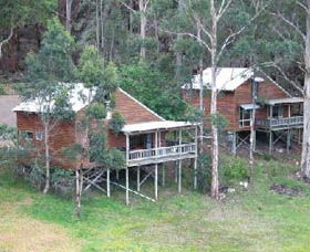 Karma Chalets - Palm Beach Accommodation 0