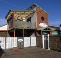 Black Dolphin Townhouse and Apartment - Palm Beach Accommodation