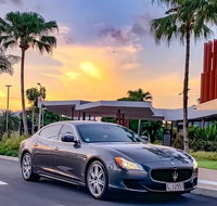 Maserati Quattroporte Limousine Transfer Cairns Airport to City - Palm Beach Accommodation