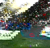 Community Christmas Party and Carols by Candlelight - Palm Beach Accommodation