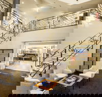Quest Savoy - Palm Beach Accommodation