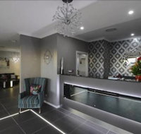 Aastro Dish Motor Inn - Palm Beach Accommodation