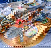 Enigma at the Piazza - Palm Beach Accommodation