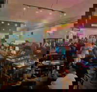 Token Arcade  Kitchen - Palm Beach Accommodation