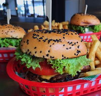 Grunske's by the River - Palm Beach Accommodation