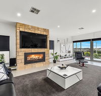 KENNEDY EXECUTIVE TOWNHOUSE - Palm Beach Accommodation
