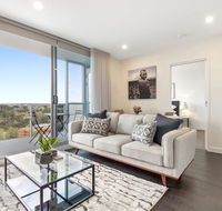 Brand New Apartment With Balcony Gym and Sauna - Palm Beach Accommodation