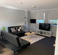 Cozy 3BR Townhouse in Liverpool CBD with parking - Palm Beach Accommodation