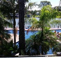 Cypress waterfront spa apartment - Palm Beach Accommodation