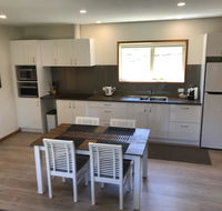 Loma Cottages - Palm Beach Accommodation