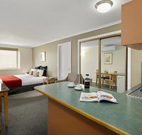 Quest Waterfront - Palm Beach Accommodation