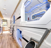 Space Q Capsule Hotel - Palm Beach Accommodation