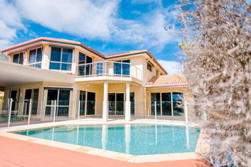 Peaceful Waterfront Home with Palm Beach Accommodation