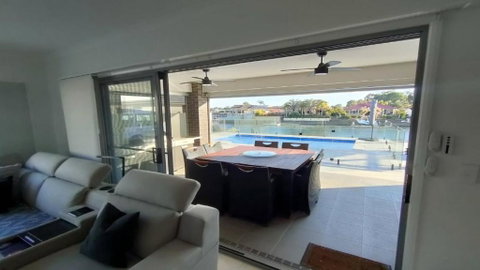 Relax Poolside By The Canal - Palm Beach Accommodation 0